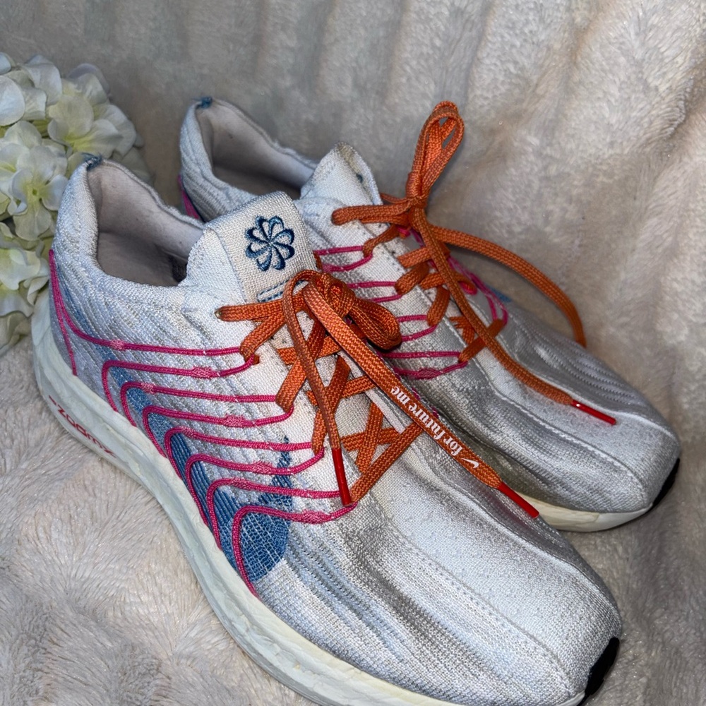 Nike Women's White Running Shoes with Pink, Blue & Orange Accents size 10.5